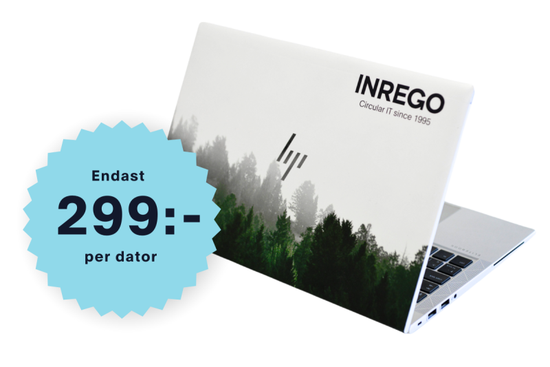 Begagnad laptop med foliering med skogsmotiv.